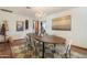 Dining area showcasing an elegant table and chairs set under a chandelier at 7526 E Edgemont Ave, Scottsdale, AZ 85257