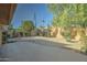 Backyard with desert landscaping, clear blue sky, and mountain views at 7530 E Mariposa Dr, Scottsdale, AZ 85251