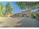 Backyard with desert landscaping, privacy wall, and mountain views at 7530 E Mariposa Dr, Scottsdale, AZ 85251