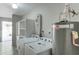 Practical laundry area with washer, dryer, and utility sink at 7530 E Mariposa Dr, Scottsdale, AZ 85251