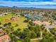 Aerial view showcasing a baseball diamond, tennis courts, and basketball courts in community at 10115 E Mountain View Rd # 2112, Scottsdale, AZ 85258