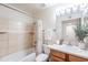 Cozy bathroom with a tub/shower combination and neutral decor at 10115 E Mountain View Rd # 2112, Scottsdale, AZ 85258