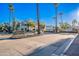 Community entrance with decorative monument sign and brick-paved street at 10115 E Mountain View Rd # 2112, Scottsdale, AZ 85258