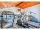 Well-equipped gym featuring modern machines and a vaulted wood ceiling at 10115 E Mountain View Rd # 2112, Scottsdale, AZ 85258