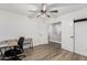 Bedroom area featuring vinyl plank flooring, ceiling fan, and large closet at 1114 S Grenoble --, Mesa, AZ 85208