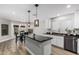 Beautiful kitchen area featuring granite counters, modern appliances, and barstool seating at 1114 S Grenoble --, Mesa, AZ 85208