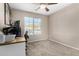 Neutral bedroom showing a window with blinds and neutral carpet at 11457 W Madisen Ellise Dr, Surprise, AZ 85378