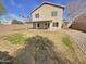 Expansive backyard with a covered patio and potential for outdoor entertaining at 11595 W Holly St, Avondale, AZ 85392