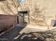 Home side entrance featuring neutral paint and brick accent at 11595 W Holly St, Avondale, AZ 85392