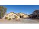 Charming single-story home with a two-car garage, desert landscaping, and neutral-colored exterior at 11910 W Daley Ct, Sun City, AZ 85373