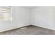 Bedroom featuring carpeted floor, baseboards, bright light and window at 11928 E Aster Ln, Florence, AZ 85132