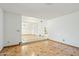 Living room with decorative floors, steps up to another space, and white paint at 1201 W Dahlia Dr, Phoenix, AZ 85029