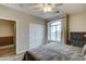 Bright bedroom with a large window and closet, showcasing the home's interior at 14674 W Windsor Ave, Goodyear, AZ 85395