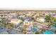 Expansive aerial view of a home featuring a pool, patio, and solar panels in a residential neighborhood at 15652 N 175Th Ct, Surprise, AZ 85388