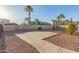 Large backyard features a concrete pad and desert landscaping at 15652 N 175Th Ct, Surprise, AZ 85388