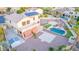 Aerial view of the backyard, showcasing the pool, patio area, landscaping and outdoor shed at 15652 N 175Th Ct, Surprise, AZ 85388