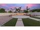 Beautiful outdoor space features a circular patio and fire pit for evening enjoyment at 15652 N 175Th Ct, Surprise, AZ 85388