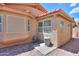 Private backyard featuring a gravel landscape, an air conditioning unit, and a trash can at 1762 N Terrace Cir, Casa Grande, AZ 85122