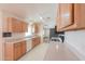 This well-lit kitchen features light countertops and plenty of cabinet space at 1762 N Terrace Cir, Casa Grande, AZ 85122