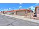 Charming neighborhood street featuring homes with red tile roofs and well-maintained exteriors at 1762 N Terrace Cir, Casa Grande, AZ 85122