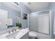 Bathroom with a shower-tub combo, brushed nickel fixtures, and soft blue walls at 1846 N Sunview --, Mesa, AZ 85205