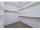 Spacious walk-in closet with ample shelving and rod space for optimal storage at 1846 N Sunview --, Mesa, AZ 85205