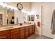 Bathroom featuring double sinks, vanity lighting, and granite counters at 19727 E Julius Rd, Queen Creek, AZ 85142