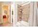 Bathroom featuring a tiled shower-tub, recessed lighting, and ample storage at 19727 E Julius Rd, Queen Creek, AZ 85142