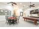 Elegant dining area with stylish decor and table, connecting to the game room area at 19727 E Julius Rd, Queen Creek, AZ 85142