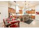 Bright and airy kitchen with custom cabinetry, stainless steel appliances, and a breakfast bar for casual dining at 19727 E Julius Rd, Queen Creek, AZ 85142