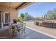 Outdoor dining area and cozy seating area for relaxing by the pool at 19727 E Julius Rd, Queen Creek, AZ 85142