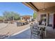 Expansive patio with dining and seating areas, perfect for entertaining guests at 19727 E Julius Rd, Queen Creek, AZ 85142