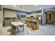 Spacious eat-in kitchen featuring stainless steel appliances, countertops, and an adjacent dining area at 20477 N 91St Dr, Peoria, AZ 85382