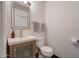 Bathroom featuring a modern vanity, stylish mirror, toilet, and tasteful decor for added appeal at 2142 E Turney Ave # 4, Phoenix, AZ 85016