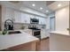 Well-lit kitchen with stainless steel appliances and white quartz countertops at 2142 E Turney Ave # 4, Phoenix, AZ 85016