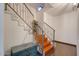 Staircase showcasing a modern railing design, wooden steps, and a decorative chest at 2142 E Turney Ave # 4, Phoenix, AZ 85016