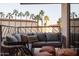 Relaxing balcony with comfortable seating and views of palm trees, creating a perfect outdoor retreat at 2201 N Central Ave # 2A, Phoenix, AZ 85004