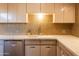 Beautiful kitchen featuring modern backsplash, stainless steel appliances, and modern countertops at 2201 N Central Ave # 2A, Phoenix, AZ 85004