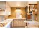 Stylish kitchen with updated appliances, a breakfast bar, and modern cabinetry at 2201 N Central Ave # 2A, Phoenix, AZ 85004