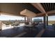 Stylish covered patio with seating and stunning city views at 2201 N Central Ave # 2A, Phoenix, AZ 85004