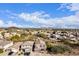 Expansive aerial view of a residential neighborhood featuring desert landscaping and mountain views in the distance at 22905 N 19Th Way, Phoenix, AZ 85024