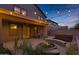 Inviting backyard with pavers, hot tub, fire pit, and string lights; perfect for outdoor relaxation and entertaining at 22905 N 19Th Way, Phoenix, AZ 85024