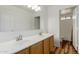 Bathroom featuring double sinks and shower with tub at 22905 N 19Th Way, Phoenix, AZ 85024