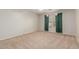 Bedroom with neutral colored walls, carpet flooring and small window with curtains at 22905 N 19Th Way, Phoenix, AZ 85024