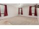 Large bedroom with neutral color walls, carpet flooring and two windows at 22905 N 19Th Way, Phoenix, AZ 85024