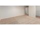 Empty bedroom with neutral walls, carpet flooring and big closet with shelving at 22905 N 19Th Way, Phoenix, AZ 85024