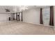 Spacious bonus room with neutral carpet, a ceiling fan, projector and several windows at 22905 N 19Th Way, Phoenix, AZ 85024