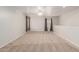 Bright bonus room with neutral carpet, ceiling fan and large windows at 22905 N 19Th Way, Phoenix, AZ 85024