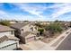 View of a desert landscaped two story home with a two car garage and large driveway at 22905 N 19Th Way, Phoenix, AZ 85024