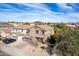 Exterior view of a desert landscaped two story home with a two car garage and driveway at 22905 N 19Th Way, Phoenix, AZ 85024